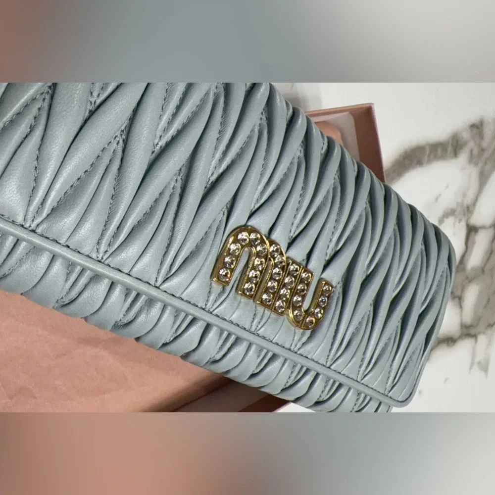 Miu Miu Matelasse Bifold Long Wallet Logo Leather Cielo Blue